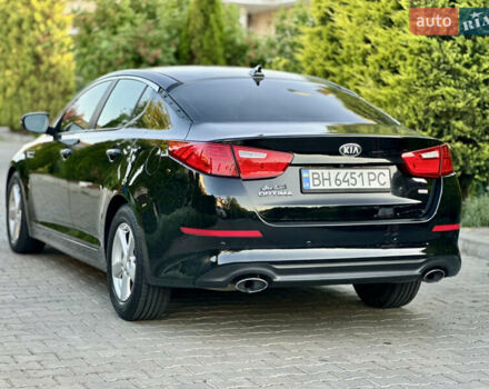 Черный Киа Оптима, объемом двигателя 2.36 л и пробегом 115 тыс. км за 10500 $, фото 13 на Automoto.ua