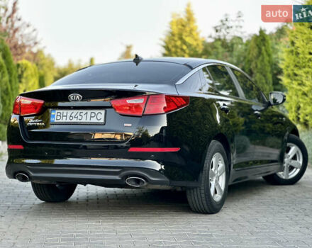 Черный Киа Оптима, объемом двигателя 2.36 л и пробегом 115 тыс. км за 10500 $, фото 2 на Automoto.ua