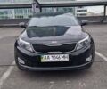 Чорний Кіа Оптіма, об'ємом двигуна 2.36 л та пробігом 216 тис. км за 10800 $, фото 1 на Automoto.ua
