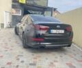 Чорний Кіа Оптіма, об'ємом двигуна 2 л та пробігом 145 тис. км за 11750 $, фото 1 на Automoto.ua
