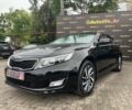 Черный Киа Оптима, объемом двигателя 2 л и пробегом 247 тыс. км за 9500 $, фото 1 на Automoto.ua