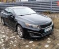 Черный Киа Оптима, объемом двигателя 2 л и пробегом 104 тыс. км за 10000 $, фото 1 на Automoto.ua