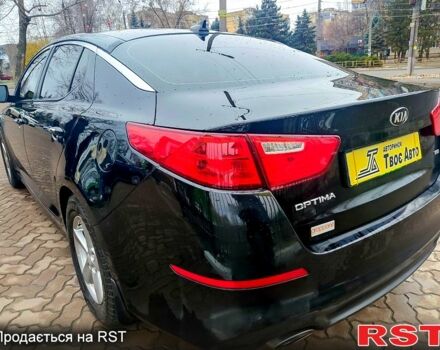 Черный Киа Оптима, объемом двигателя 24 л и пробегом 115 тыс. км за 10300 $, фото 3 на Automoto.ua