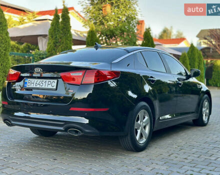 Черный Киа Оптима, объемом двигателя 2.36 л и пробегом 115 тыс. км за 10500 $, фото 14 на Automoto.ua