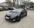 Черный Киа Оптима, объемом двигателя 2 л и пробегом 247 тыс. км за 10600 $, фото 1 на Automoto.ua
