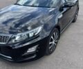 Чорний Кіа Оптіма, об'ємом двигуна 2.4 л та пробігом 173 тис. км за 10800 $, фото 1 на Automoto.ua