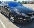 Черный Киа Оптима, объемом двигателя 2.36 л и пробегом 130 тыс. км за 11300 $, фото 1 на Automoto.ua