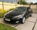 Черный Киа Оптима, объемом двигателя 2.4 л и пробегом 180 тыс. км за 8500 $, фото 1 на Automoto.ua