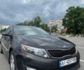 Черный Киа Оптима, объемом двигателя 2.4 л и пробегом 285 тыс. км за 10800 $, фото 3 на Automoto.ua