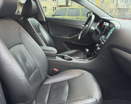 Чорний Кіа Оптіма, об'ємом двигуна 2.36 л та пробігом 168 тис. км за 10999 $, фото 22 на Automoto.ua