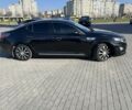 Черный Киа Оптима, объемом двигателя 0.24 л и пробегом 156 тыс. км за 12500 $, фото 1 на Automoto.ua