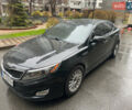 Черный Киа Оптима, объемом двигателя 2.4 л и пробегом 150 тыс. км за 9700 $, фото 2 на Automoto.ua