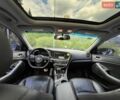 Чорний Кіа Оптіма, об'ємом двигуна 2 л та пробігом 125 тис. км за 9500 $, фото 1 на Automoto.ua