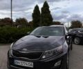 Черный Киа Оптима, объемом двигателя 2.36 л и пробегом 231 тыс. км за 11500 $, фото 1 на Automoto.ua