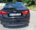 Черный Киа Оптима, объемом двигателя 2.36 л и пробегом 172 тыс. км за 11200 $, фото 3 на Automoto.ua