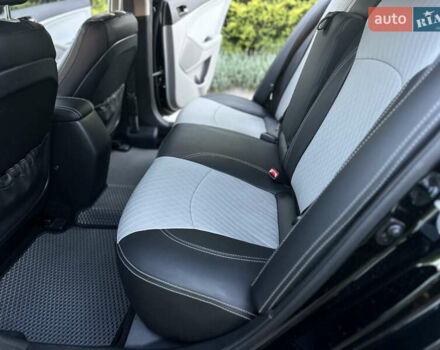 Черный Киа Оптима, объемом двигателя 2.36 л и пробегом 115 тыс. км за 10500 $, фото 27 на Automoto.ua