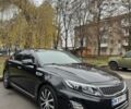 Чорний Кіа Оптіма, об'ємом двигуна 2.4 л та пробігом 168 тис. км за 10999 $, фото 1 на Automoto.ua