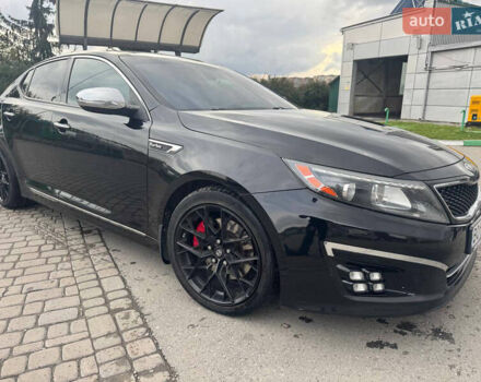 Черный Киа Оптима, объемом двигателя 2 л и пробегом 280 тыс. км за 9750 $, фото 4 на Automoto.ua