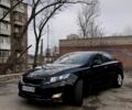 Черный Киа Оптима, объемом двигателя 2 л и пробегом 187 тыс. км за 8799 $, фото 1 на Automoto.ua