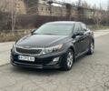 Черный Киа Оптима, объемом двигателя 2.4 л и пробегом 210 тыс. км за 9800 $, фото 1 на Automoto.ua