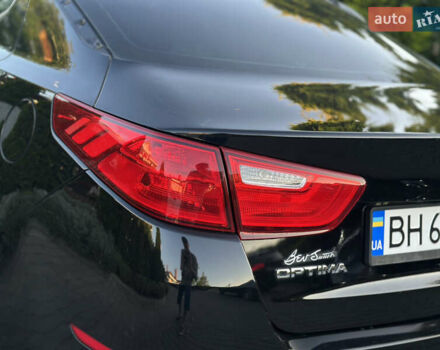 Черный Киа Оптима, объемом двигателя 2.36 л и пробегом 115 тыс. км за 10500 $, фото 21 на Automoto.ua
