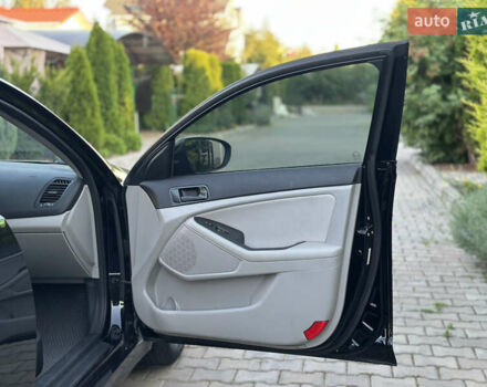 Черный Киа Оптима, объемом двигателя 2.36 л и пробегом 115 тыс. км за 10500 $, фото 50 на Automoto.ua