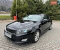 Черный Киа Оптима, объемом двигателя 2.4 л и пробегом 190 тыс. км за 7960 $, фото 1 на Automoto.ua