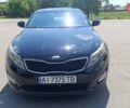 Чорний Кіа Оптіма, об'ємом двигуна 2.36 л та пробігом 172 тис. км за 11200 $, фото 1 на Automoto.ua
