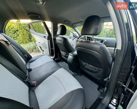 Черный Киа Оптима, объемом двигателя 2.36 л и пробегом 115 тыс. км за 10500 $, фото 23 на Automoto.ua