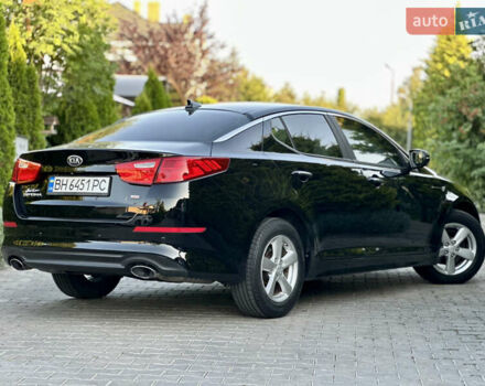 Черный Киа Оптима, объемом двигателя 2.36 л и пробегом 115 тыс. км за 10500 $, фото 7 на Automoto.ua