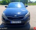 Черный Киа Оптима, объемом двигателя 2.4 л и пробегом 107 тыс. км за 11700 $, фото 1 на Automoto.ua