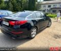 Черный Киа Оптима, объемом двигателя 2.4 л и пробегом 122 тыс. км за 8999 $, фото 1 на Automoto.ua