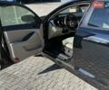 Черный Киа Оптима, объемом двигателя 2.36 л и пробегом 140 тыс. км за 9999 $, фото 2 на Automoto.ua