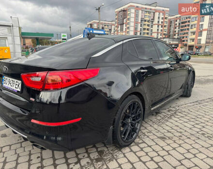 Черный Киа Оптима, объемом двигателя 2 л и пробегом 280 тыс. км за 9750 $, фото 8 на Automoto.ua