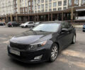 Черный Киа Оптима, объемом двигателя 2.4 л и пробегом 127 тыс. км за 10600 $, фото 1 на Automoto.ua