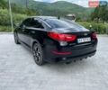 Чорний Кіа Оптіма, об'ємом двигуна 2 л та пробігом 130 тис. км за 8700 $, фото 2 на Automoto.ua
