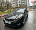 Черный Киа Оптима, объемом двигателя 2.4 л и пробегом 150 тыс. км за 9700 $, фото 1 на Automoto.ua