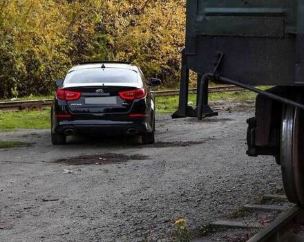 Черный Киа Оптима, объемом двигателя 2 л и пробегом 74 тыс. км за 5800 $, фото 6 на Automoto.ua