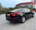 Черный Киа Оптима, объемом двигателя 2.36 л и пробегом 198 тыс. км за 8600 $, фото 2 на Automoto.ua