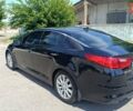 Черный Киа Оптима, объемом двигателя 2.36 л и пробегом 172 тыс. км за 11200 $, фото 6 на Automoto.ua