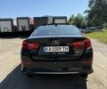 Черный Киа Оптима, объемом двигателя 2 л и пробегом 126 тыс. км за 6319 $, фото 2 на Automoto.ua