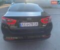 Черный Киа Оптима, объемом двигателя 2.36 л и пробегом 241 тыс. км за 9250 $, фото 2 на Automoto.ua