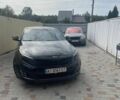 Чорний Кіа Оптіма, об'ємом двигуна 2 л та пробігом 145 тис. км за 11750 $, фото 2 на Automoto.ua