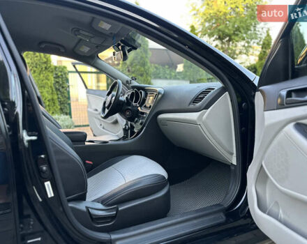 Черный Киа Оптима, объемом двигателя 2.36 л и пробегом 115 тыс. км за 10500 $, фото 52 на Automoto.ua