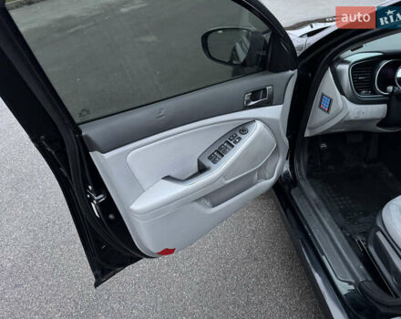 Черный Киа Оптима, объемом двигателя 2.36 л и пробегом 183 тыс. км за 8750 $, фото 24 на Automoto.ua