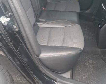 Чорний Кіа Оптіма, об'ємом двигуна 2.36 л та пробігом 216 тис. км за 10800 $, фото 8 на Automoto.ua