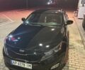 Черный Киа Оптима, объемом двигателя 2.36 л и пробегом 130 тыс. км за 11000 $, фото 1 на Automoto.ua