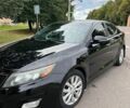 Чорний Кіа Оптіма, об'ємом двигуна 2.4 л та пробігом 239 тис. км за 10500 $, фото 1 на Automoto.ua