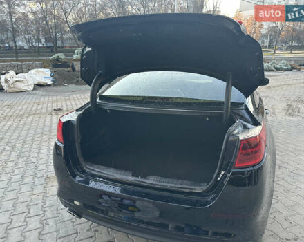 Черный Киа Оптима, объемом двигателя 2.4 л и пробегом 100 тыс. км за 8500 $, фото 9 на Automoto.ua