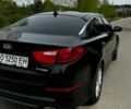 Черный Киа Оптима, объемом двигателя 0.24 л и пробегом 200 тыс. км за 10000 $, фото 1 на Automoto.ua